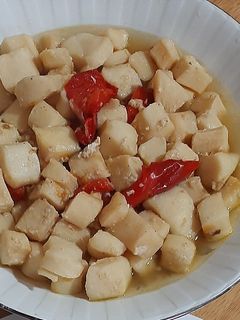 Una foto de Pota en salsa