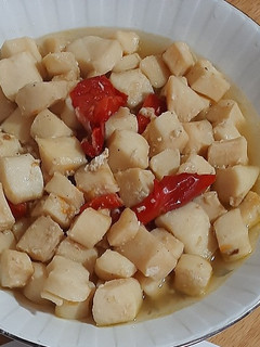 Una foto de Pota en salsa