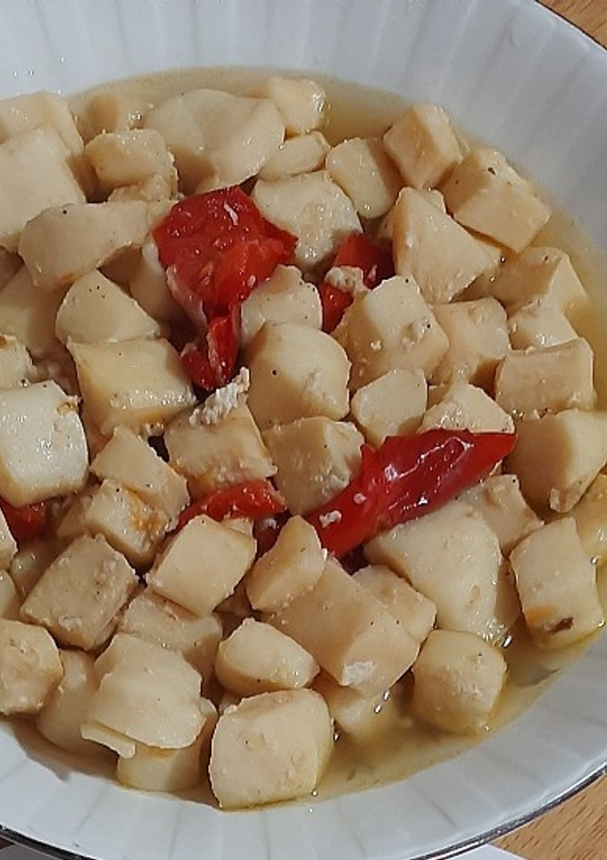 Una foto de Pota en salsa