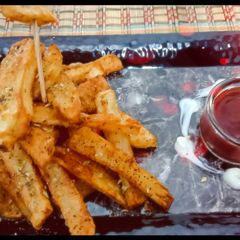 A picture of Schezwan French Fries.