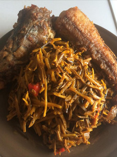 A picture of Ugba with fried fish.