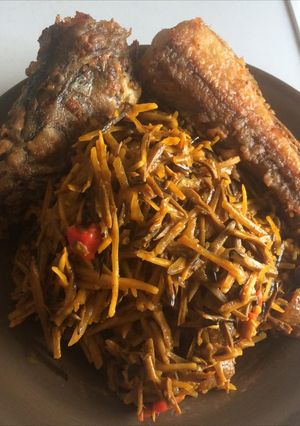A picture of Ugba with fried fish.
