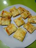 Empanada de atún, cebolla y queso de cabra