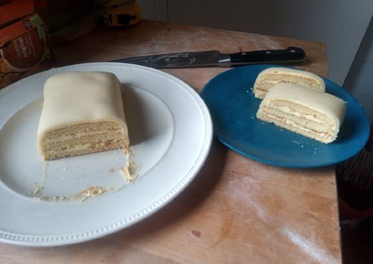 Almond paste layer cake with buttercream and strained marmelade
