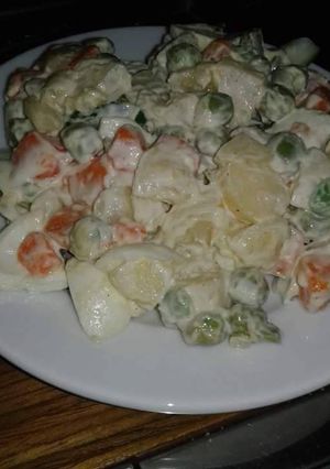 A picture of Coleslaw with irish potatoes salad cream.