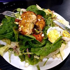 A picture of Salmon and spinach fish cakes with lemon and black pepper crust.