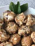 Uvas cubiertas con queso crema y nuez