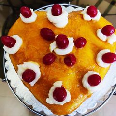 A picture of Eggless Mango Glaze Vanilla Cake.