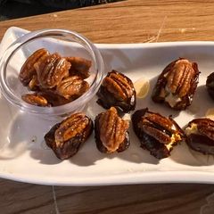 A picture of Stuffed dates with feta cheese.