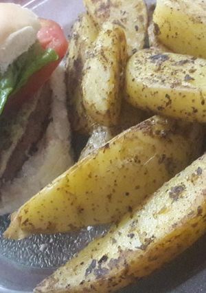Una foto de Papas rústicas a mi gusto
