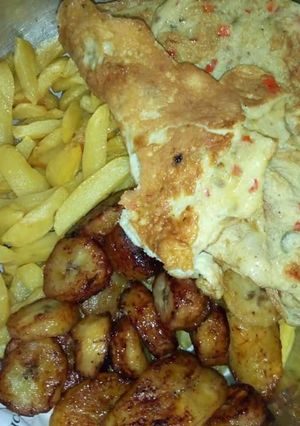 A picture of Fried irish potatoes,plantain and eggs.