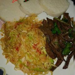 A picture of #tbt1 fried liver & sauteed cabbage.