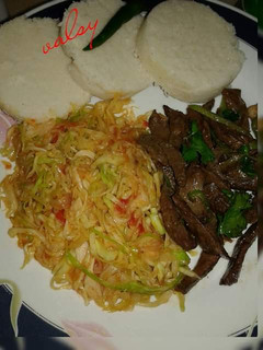 A picture of #tbt1 fried liver & sauteed cabbage.