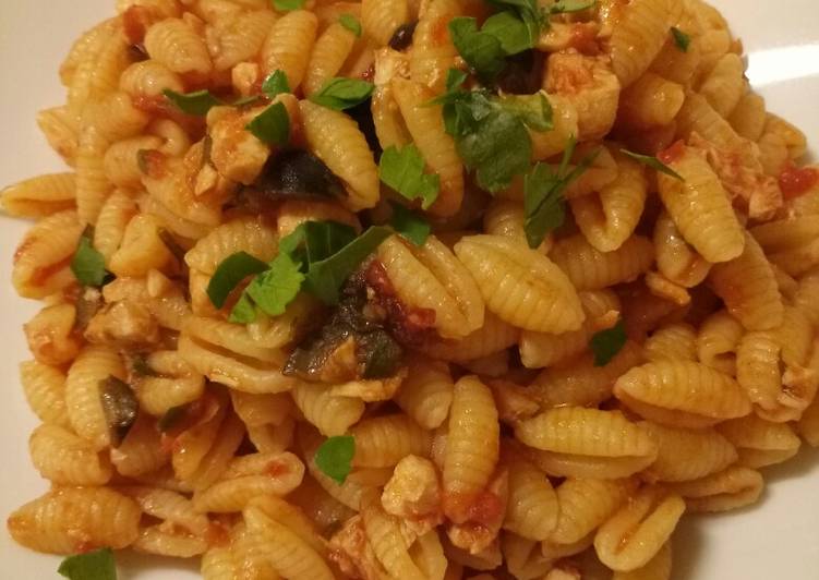 Recipe of Homemade Gnocchetti sardi with black olive and sword fish ragu