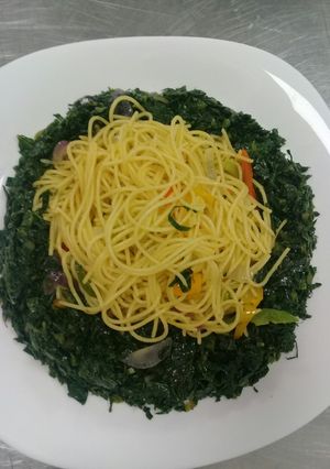 A picture of Buttered spaghetti n fried kales a.k.a sukumawiki.