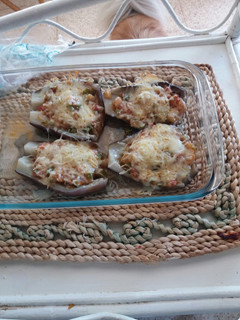 Una foto de Berenjenas rellenas de verduritas, tomate y jamón
