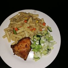 A picture of Macaroni with frozen vegetables.