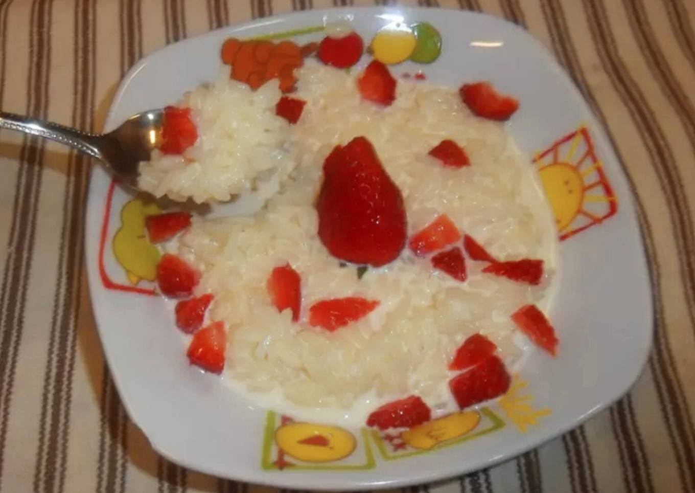 Arroz con leche y frutillas