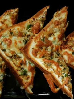 A picture of Air fried toast with chicken n cheese.