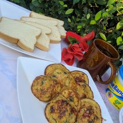 A picture of Egg bites,bread and tea.