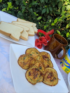 A picture of Egg bites,bread and tea.
