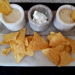 A picture of My Melted in the oven Cheese fondue with extras 😁.