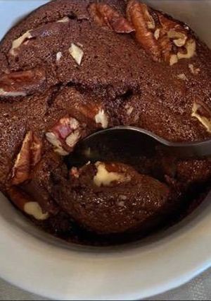 A picture of Gooey hot pud with a blueberry centre.