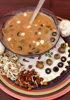 A picture of Mushroom Sprouts with Olive soup.