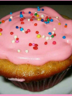 Una foto de Cup cakes de refresco de naranja