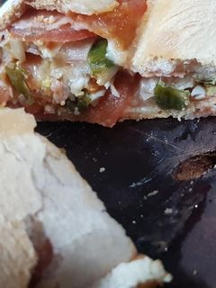 Una foto de Pizzas arrolladas