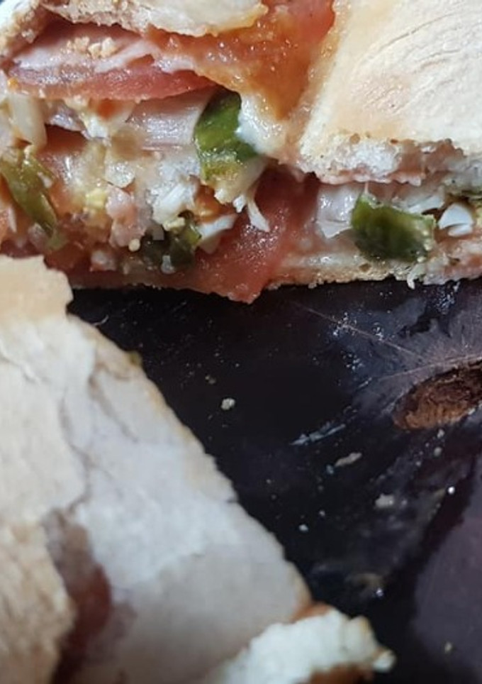 Una foto de Pizzas arrolladas
