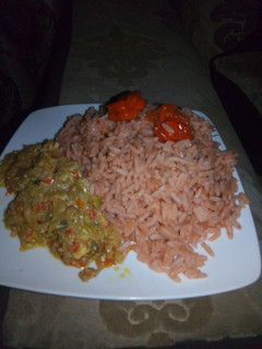 A picture of Tomato rice with cabbage and egg source.