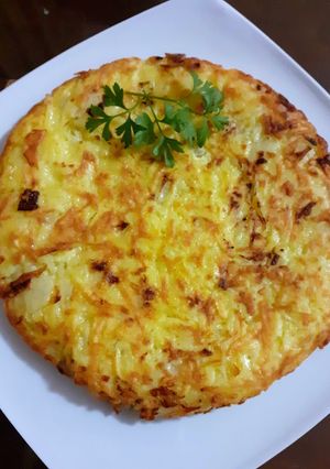 Una foto de Tortilla Rösti - Tortilla de Papa rallada Fácil al estilo Suizo