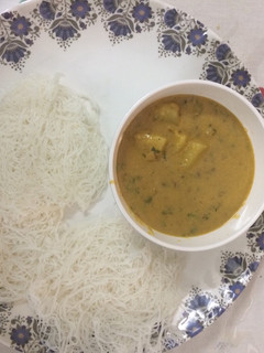 A picture of Idiyappam with stew.