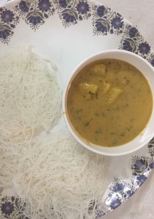 A picture of Idiyappam with stew.