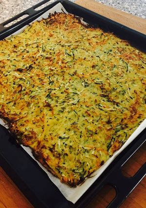 Une photo de Paillasson de pomme de terre courgette au four
