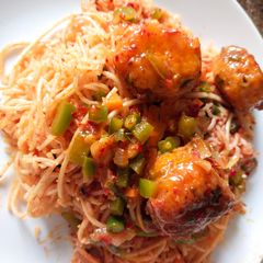 A picture of Triple Schezwan fried rice.