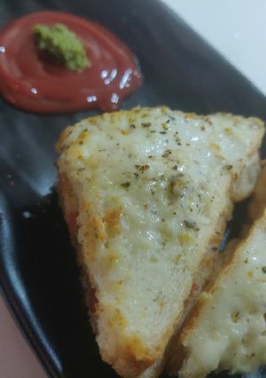 A picture of Melting cheese sandwich.
