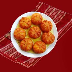 A picture of Moong dal gulab jamun.