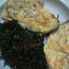 Saute kales served with omelet A picture of Saute kales served with omelet.