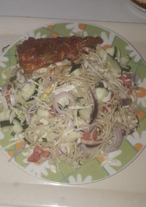 A picture of Veggie spaghetti and peppered fish.