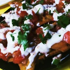 Creamy Crispy Nachos With Salsa Dip A picture of Creamy Crispy Nachos With Salsa Dip.