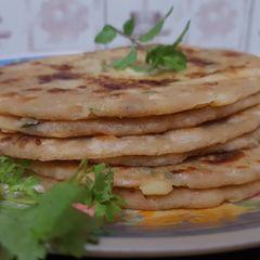 A picture of Potato cheese Paratha recipe cheese Paratha recipe unique style.