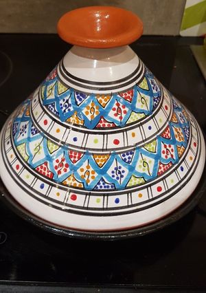 O poză a rețetei Tajine cu cârnați.