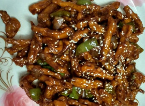 A picture of Crispy sesame honey chilly potatoes.