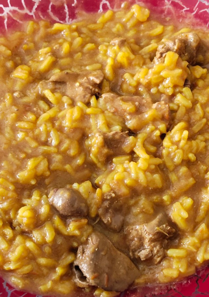 Una foto de Arroz con higaditos de pollo
