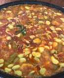 Paella de pato y conejo