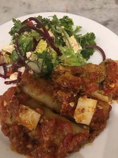 A picture of Spinach and mushroom cannelloni.
