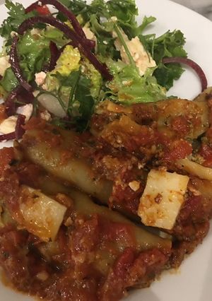 A picture of Spinach and mushroom cannelloni.