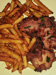 A picture of Chicken with chips.